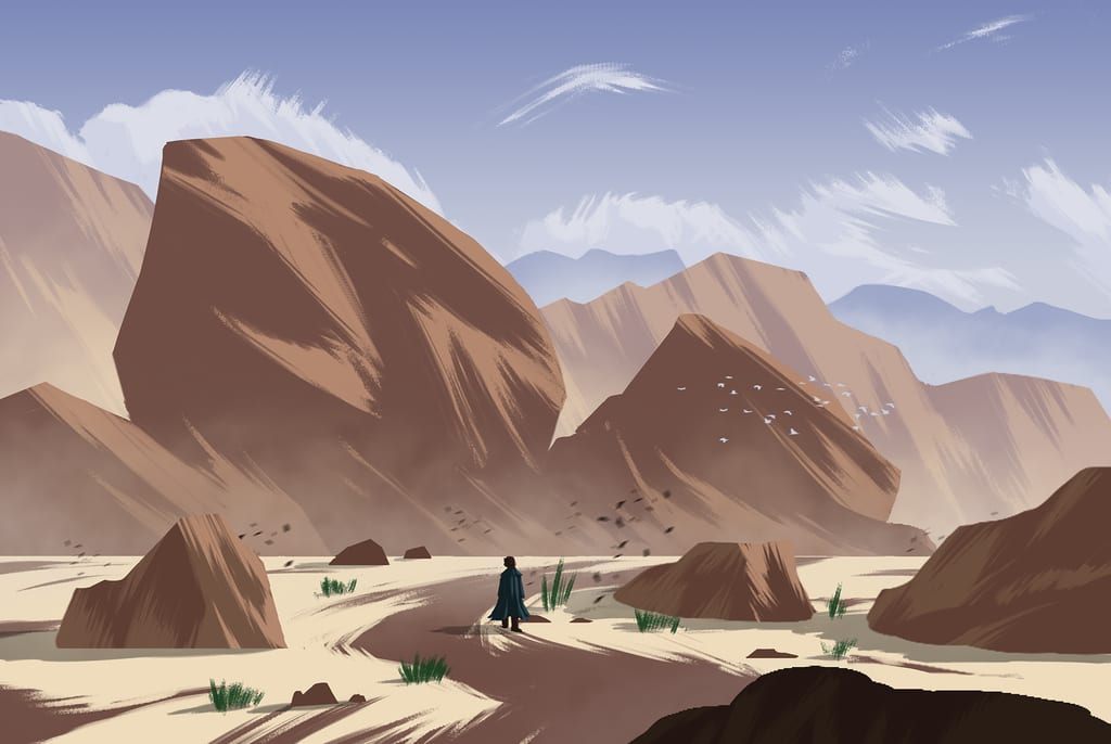 A man is walking through a desert, studying the rocks in the background as part of a Phillip Sue tutorial.